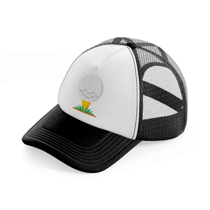 golf ball in grass black and white trucker hat